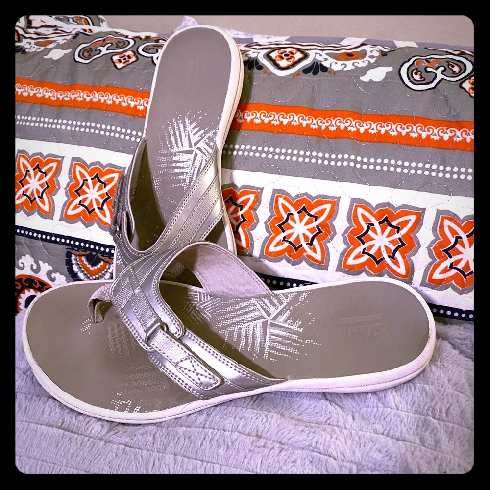 Clark’s thong sandals. Silver
